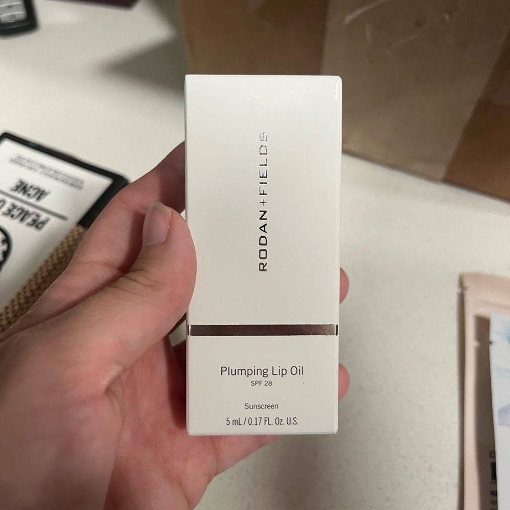 Rodan + Fields Plumping Lip Oil in Coral